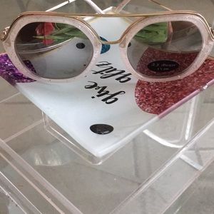 Gold and white sunglasses